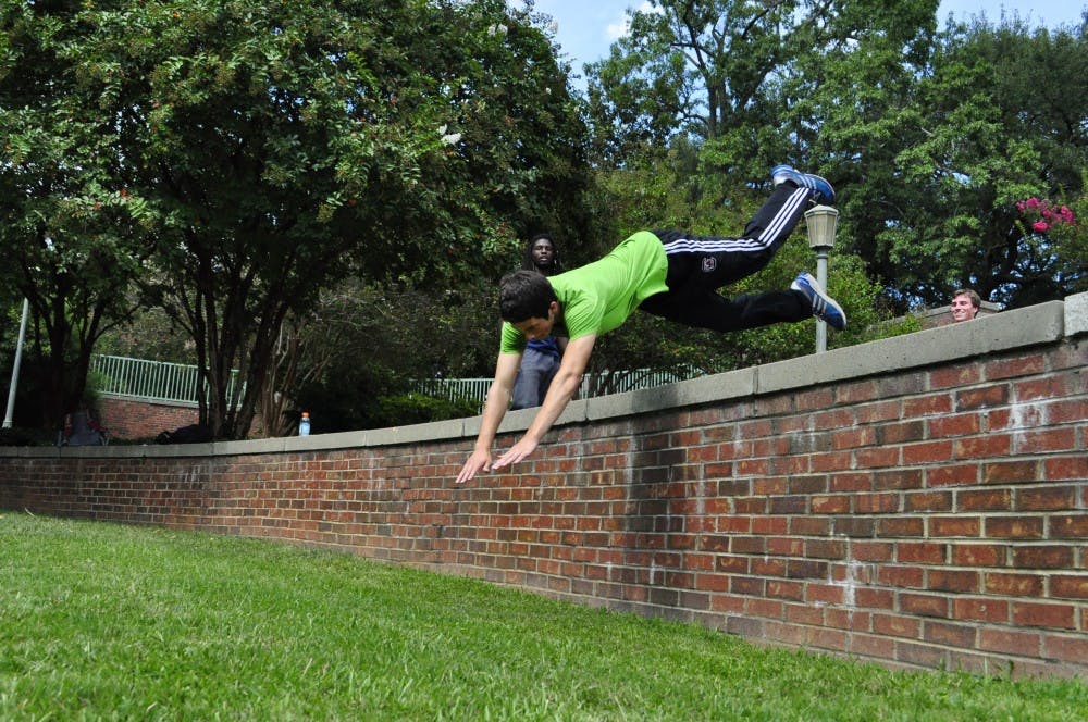 	Holaus in the middle of executing a wall roll
