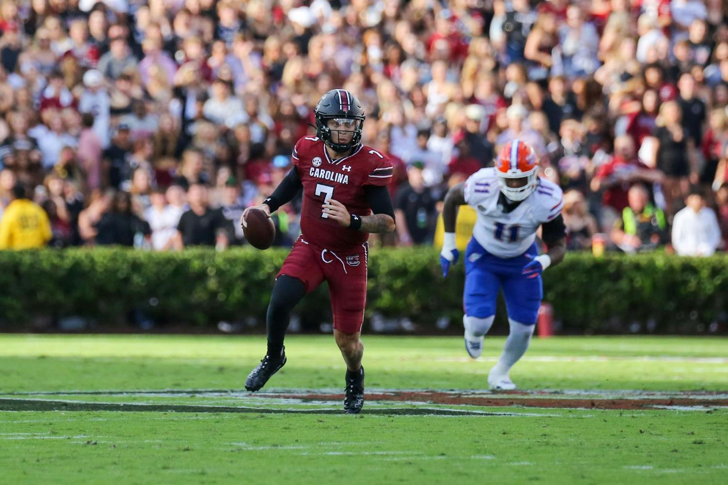 FILE — Redshirt senior quarterback Spencer Rattler runs the ball during South Carolina’s game against Florida on Oct. 14, 2023, at Williams-Brice Stadium. The Gamecocks lost to the Gators 41-39.