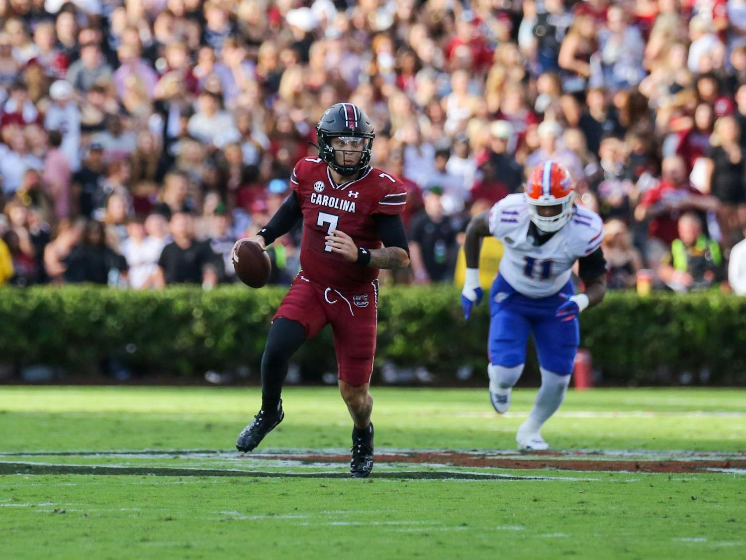 FILE — Redshirt senior quarterback Spencer Rattler runs the ball during South Carolina’s game against Florida on Oct. 14, 2023, at Williams-Brice Stadium. The Gamecocks lost to the Gators 41-39.
