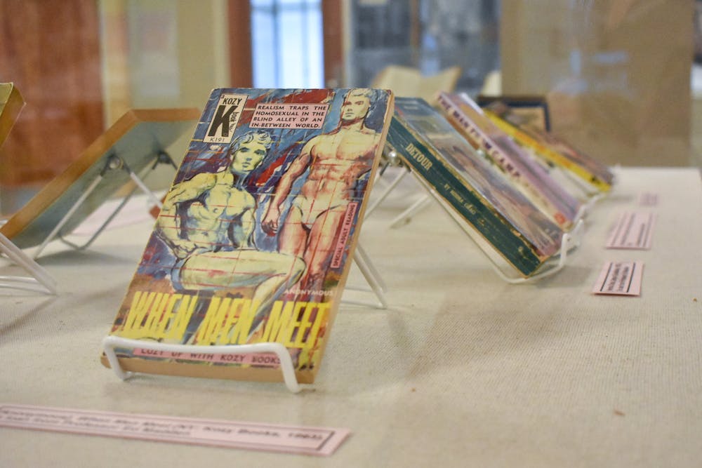 <p>The book "When Men Meet" is displayed alongside other books highlighting queer identities in the “To tell the secret of my nights and days” exhibit. The collection of books, newspapers, photos and magazines in the Thomas Cooper Library is open until January 2024.</p>