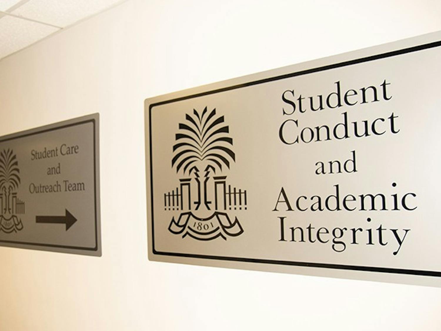 The sign outside of the Office of Student Conduct and Academic Integrity.