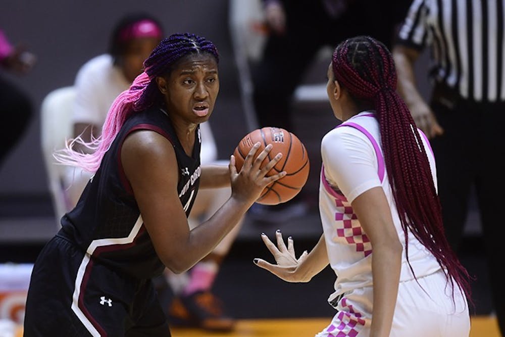 <p>Sophomore forward Aliyah Boston holds the ball while facing a Tennessee player.</p>