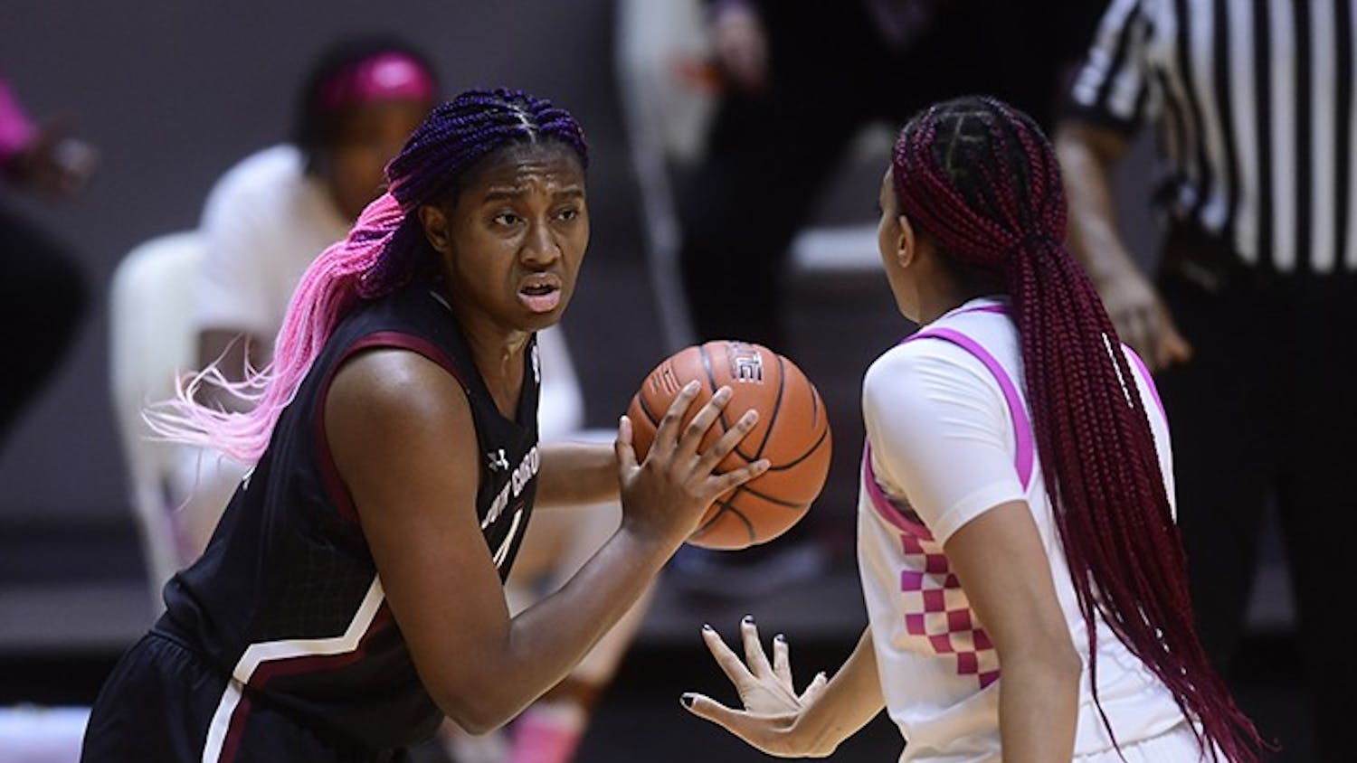 Sophomore forward Aliyah Boston holds the ball while facing a Tennessee player.