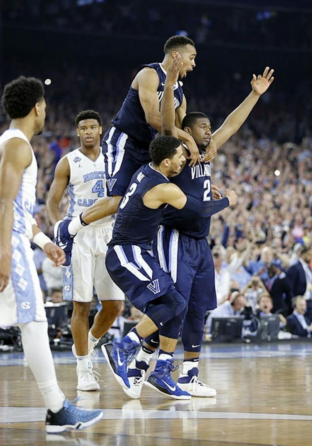 Villanova&apos;s Kris Jenkins celebrates his game-winning three-point basket over North Carolina on Monday, April 4, 2016, at NRG Stadium in Houston. (Yong Kim/Philadelphia Inquirer/TNS)