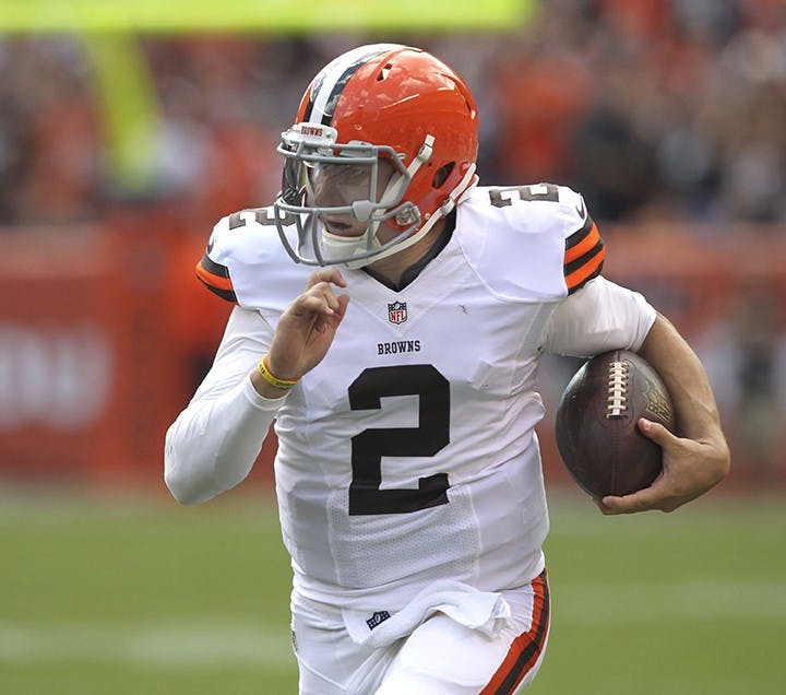Cleveland Browns back-up quarterback Johnny Manziel runs for 39 yards after a pass catch against the Baltimore Ravens hat was nullified by a penalty on Sunday, Sept. 21, 2014, at FirstEnergy Stadium in Cleveland. (Phil Masturzo/Akron Beacon Journal/MCT)