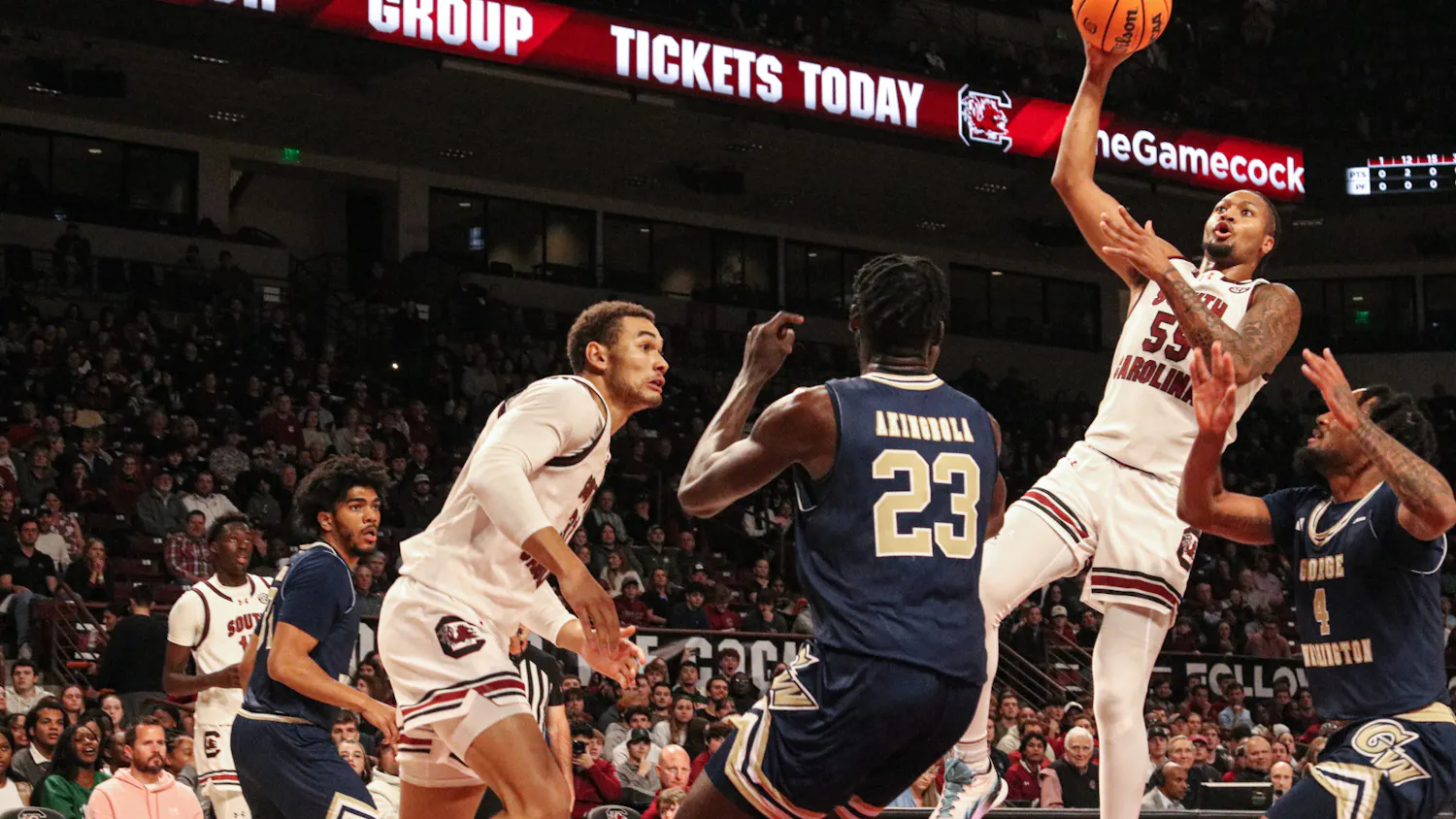 Graduate student guard Ta’lon Cooper soars above the defense in the game against George Washington on Dec. 1, 2023. Cooper, a transfer from Minnesota, has led South Carolina in assists each of the first seven games of the season.