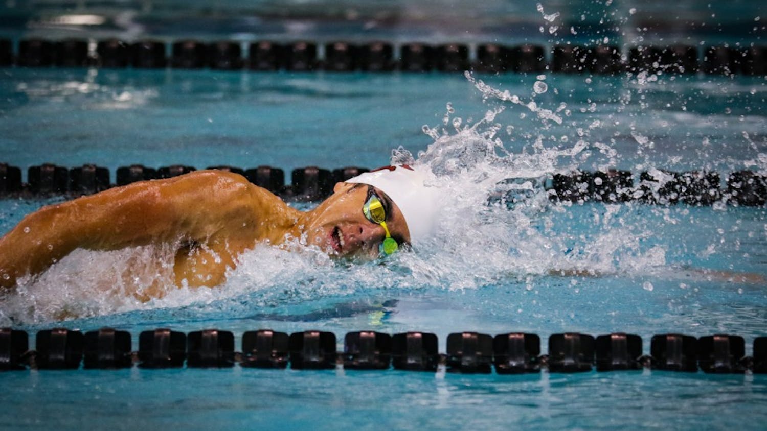 Sophomore middle distance freestyle swimmer Rafael Davila swims in the men’s 1000-meter freestyle against NC State University.