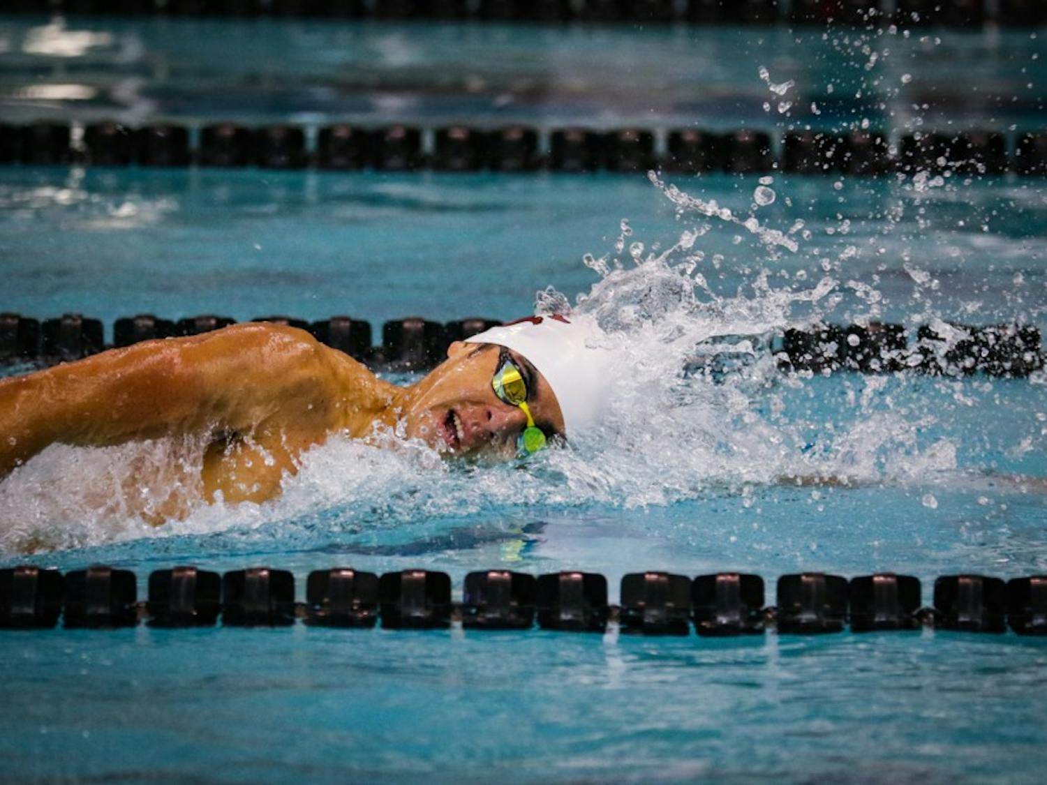 Sophomore middle distance freestyle swimmer Rafael Davila swims in the men’s 1000-meter freestyle against NC State University.