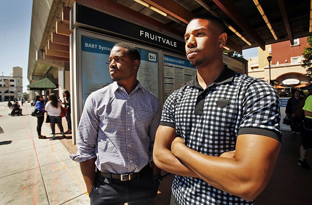 Director Ryan Coogler, left, and actor Michael B. Jordan of the film &quot;Fruitvale Station&quot; stand at the same-named BART stop in Oakland, California, on June 20, 2013. The movie is based on the events in 2009 where Oscar Grant III died in police custody. (Al Seib/Los Angeles Times/MCT)