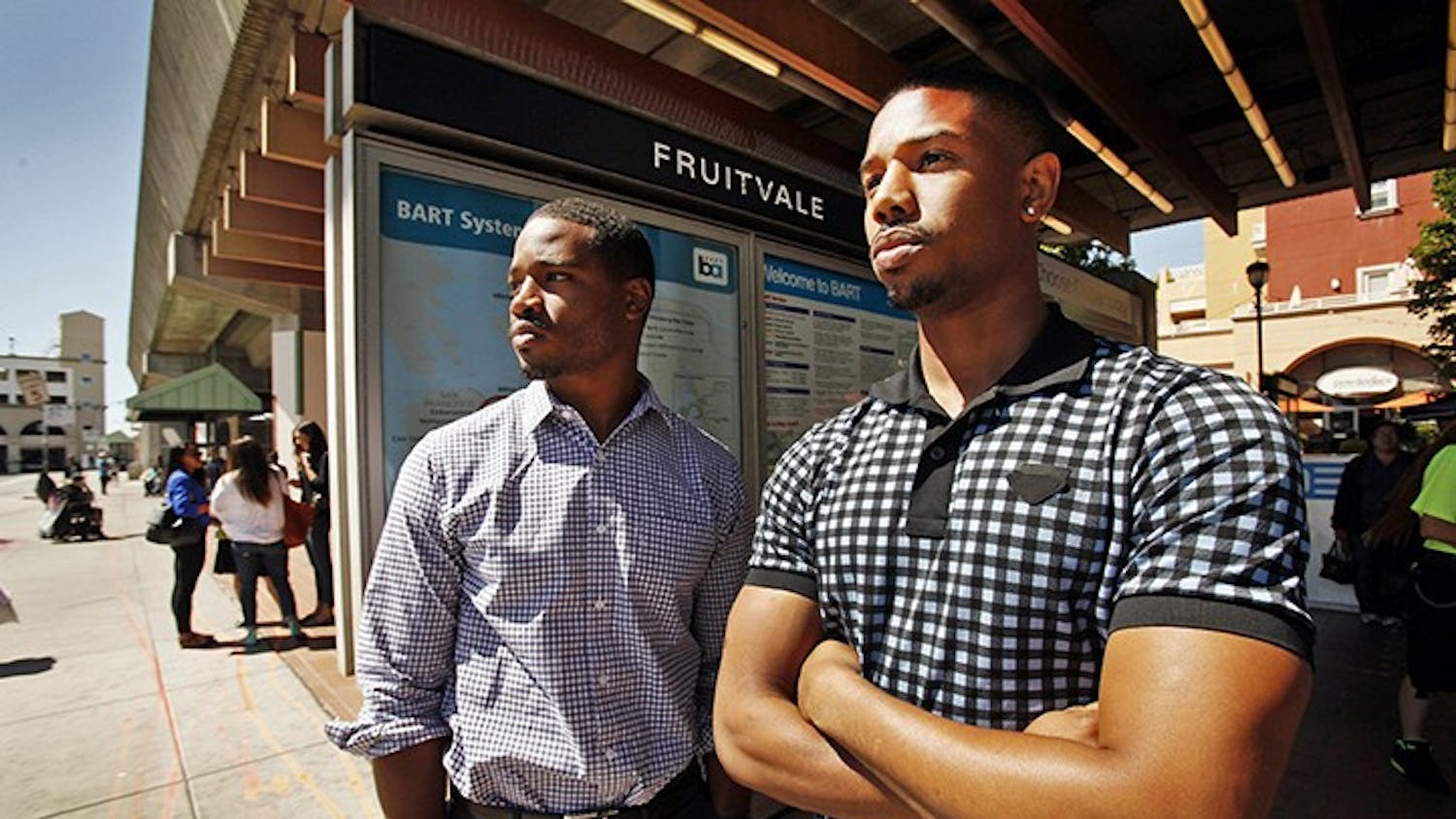 Director Ryan Coogler, left, and actor Michael B. Jordan of the film &quot;Fruitvale Station&quot; stand at the same-named BART stop in Oakland, California, on June 20, 2013. The movie is based on the events in 2009 where Oscar Grant III died in police custody. (Al Seib/Los Angeles Times/MCT)