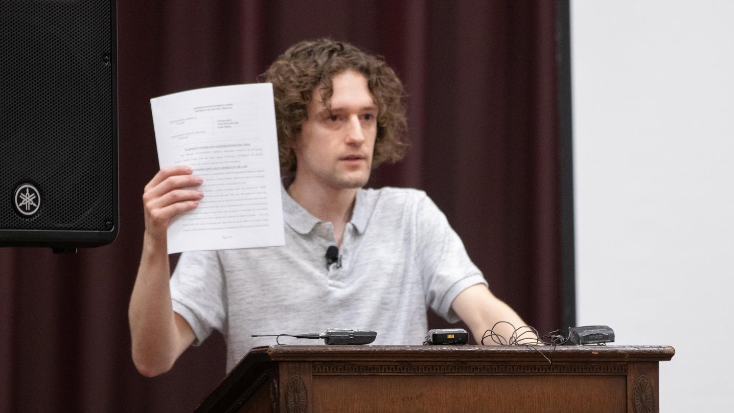 Uncensored America Founder Sean Semanko holding up the lawsuit that the organization is serving to the University of South Carolina. The Uncensored America chapter at USC held a press conference on Sept. 18, 2024 at the Russell House University Union to break the news.