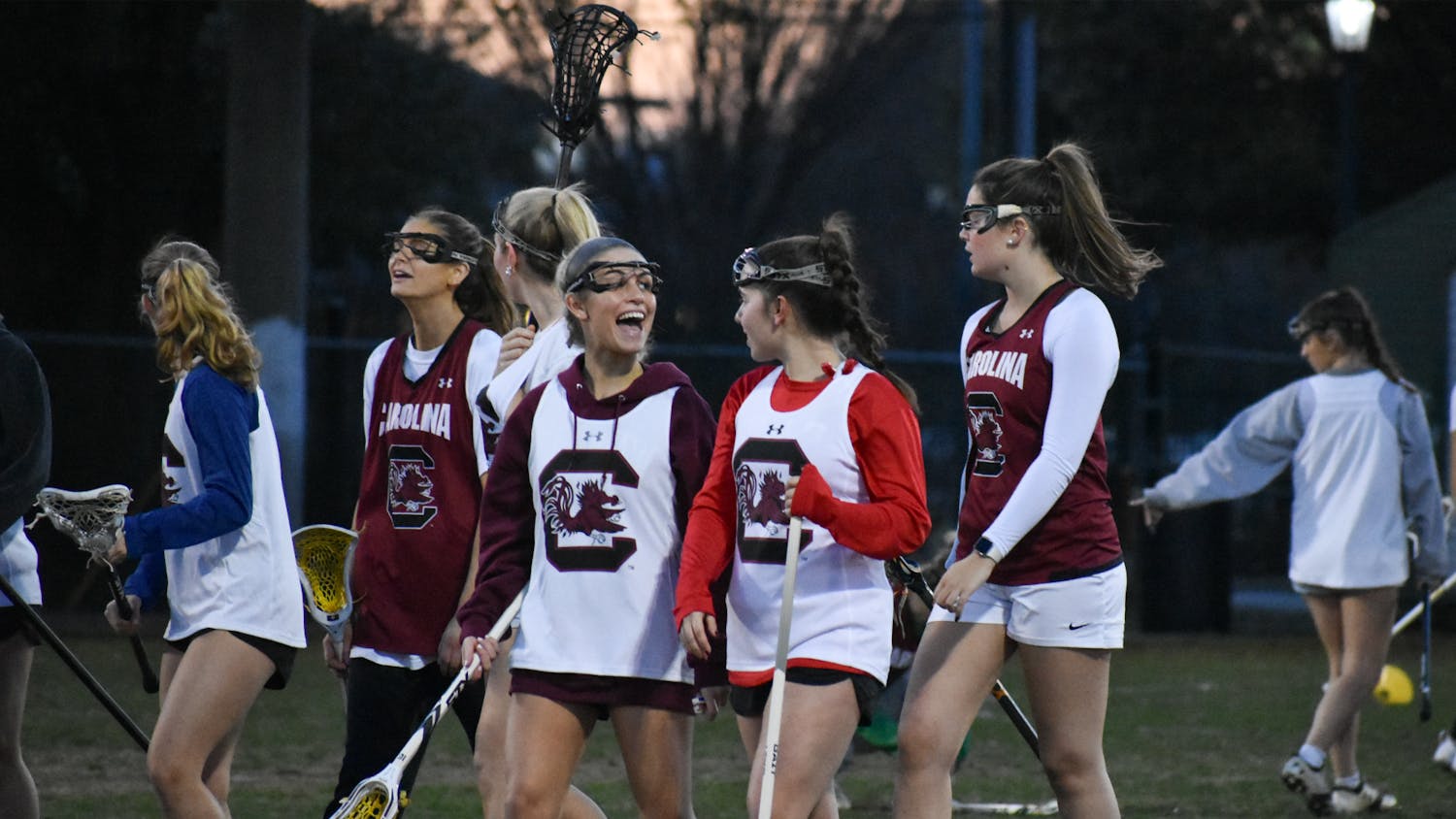 The women’s lacrosse club takes a break during practice on Jan. 24, 2023. The club was preparing to play its next game against Auburn on Jan. 28, 2023.
