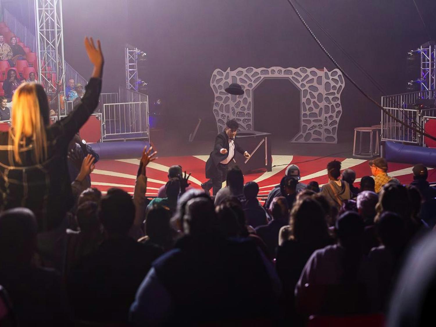 Renaldo the Clown throws his bowler hat to an audience member prior to the 7:30 p.m. showing of the CIRCUS at the Fair on Oct. 18, 2023. Renaldo performed in between acts to provide comic relief and entertain the audience while circus members prepared for upcoming acts.