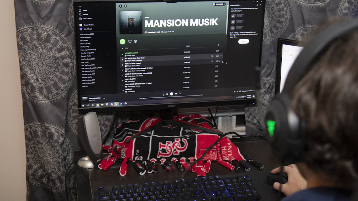 Fourth-year finance student Beck Stephenson listens to Trippie Redd's new album "Mansion Musik" on Jan 30, 2022. The new, 25-song album features lyrics from the late Juice WRLD and appearances from Lil Baby, Travis Scott, Future and other popular names in rap.