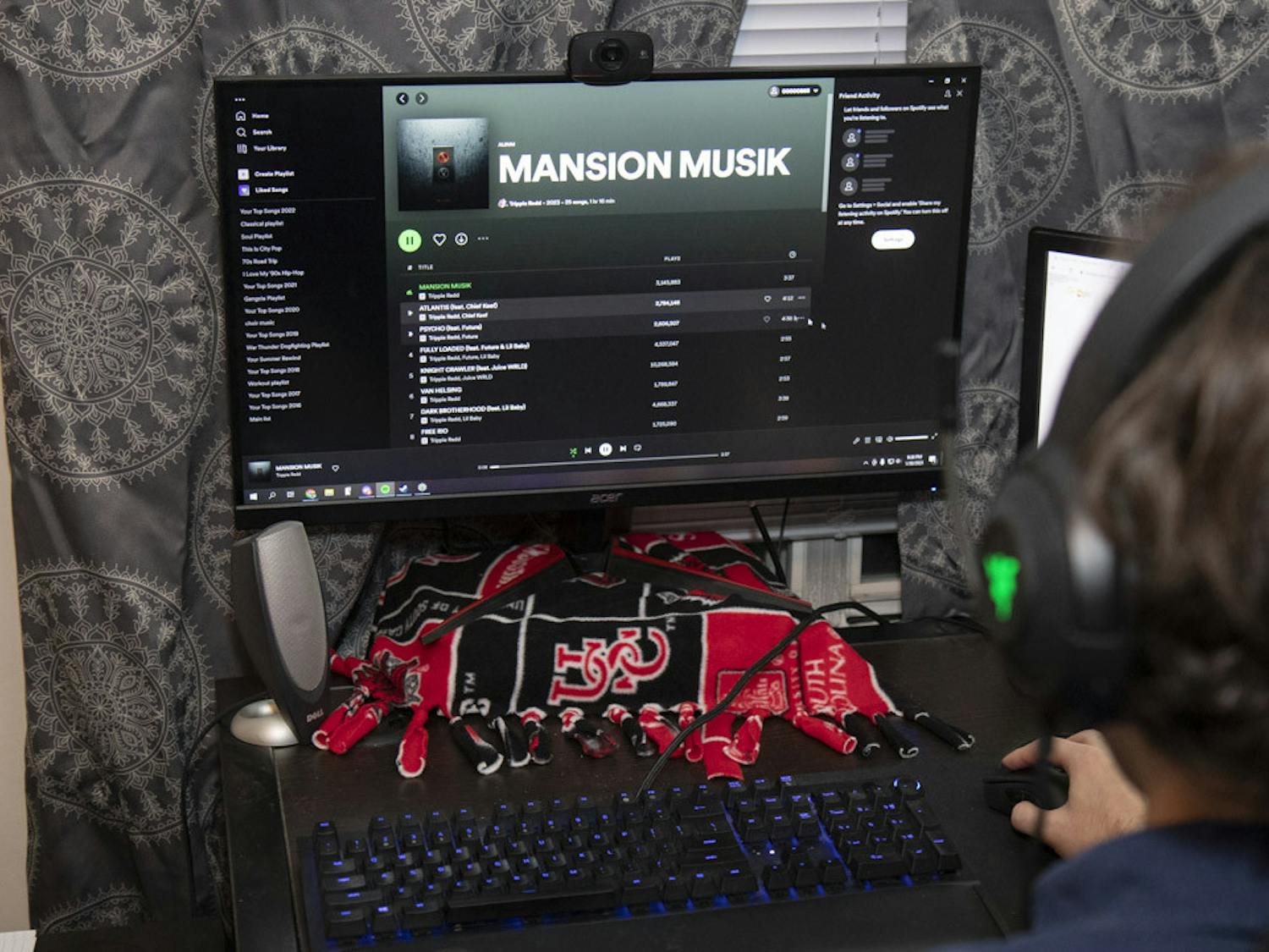 Fourth-year finance student Beck Stephenson listens to Trippie Redd's new album "Mansion Musik" on Jan 30, 2022. The new, 25-song album features lyrics from the late Juice WRLD and appearances from Lil Baby, Travis Scott, Future and other popular names in rap.