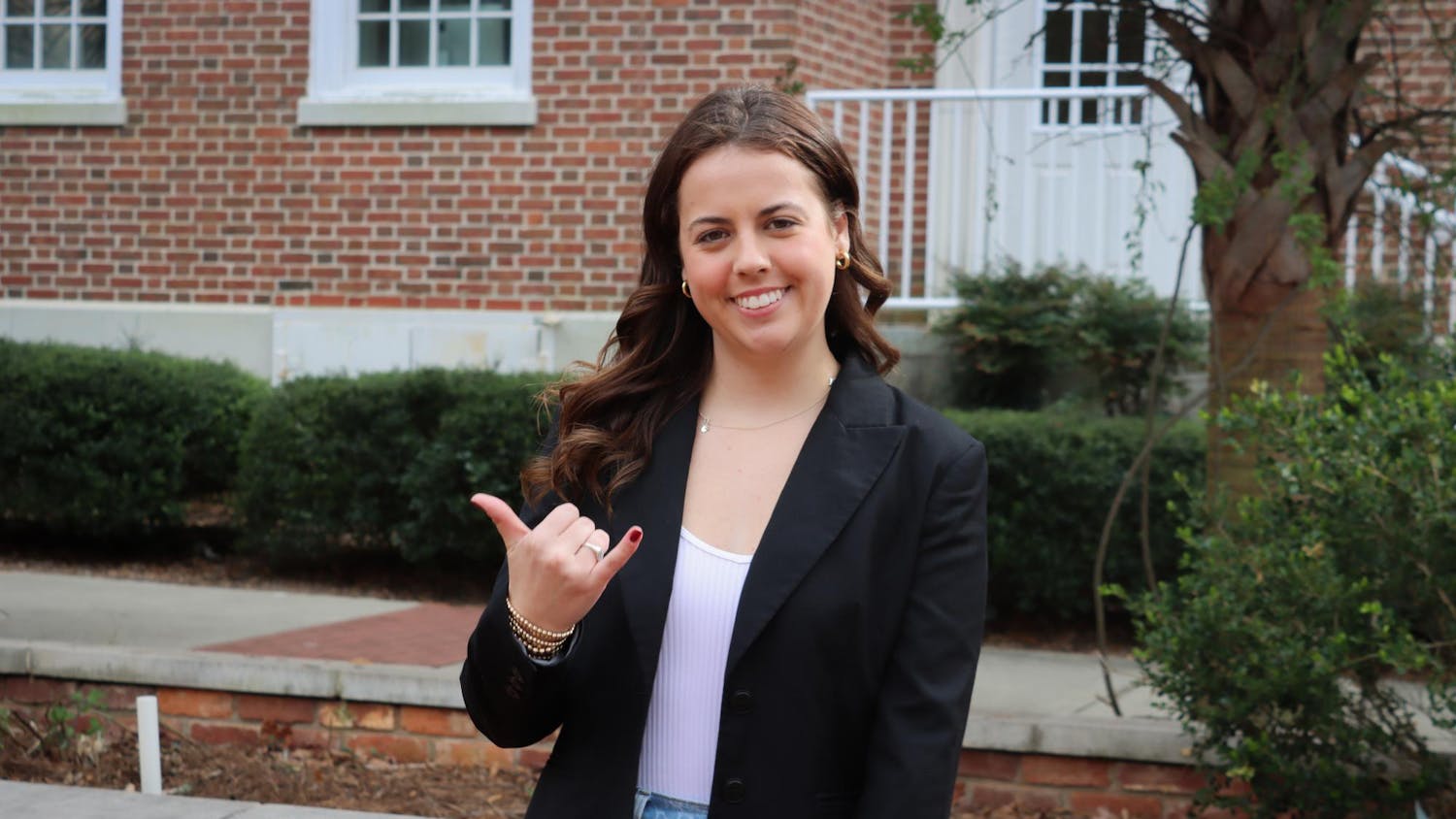 A posed photo of candidate for Student Body Speaker of the Senate, Maura Hamilton, outside of the USC school of Journalism and Mass Communications on Feb. 9, 2024. Hamilton’s campaign revolves around giving power to the students to drive change on campus.