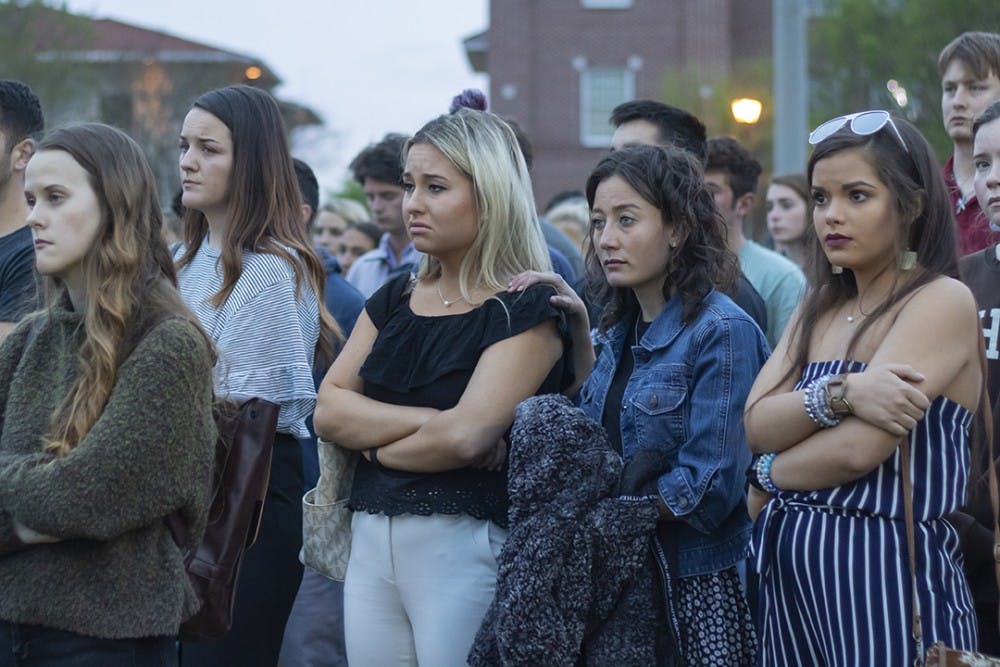 <p>Students mourn and comfort each other at a vigil for slain USC student Samantha “Sami” Josephson.</p>