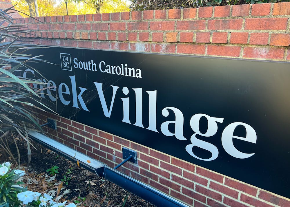 <p>FILE—The sign outside of USC's Greek Village taken on Nov. 13, 2022. There are nearly 50 Greek life organizations at USC, all of which are overseen by the Office of Fraternity and Sorority Life.</p>
