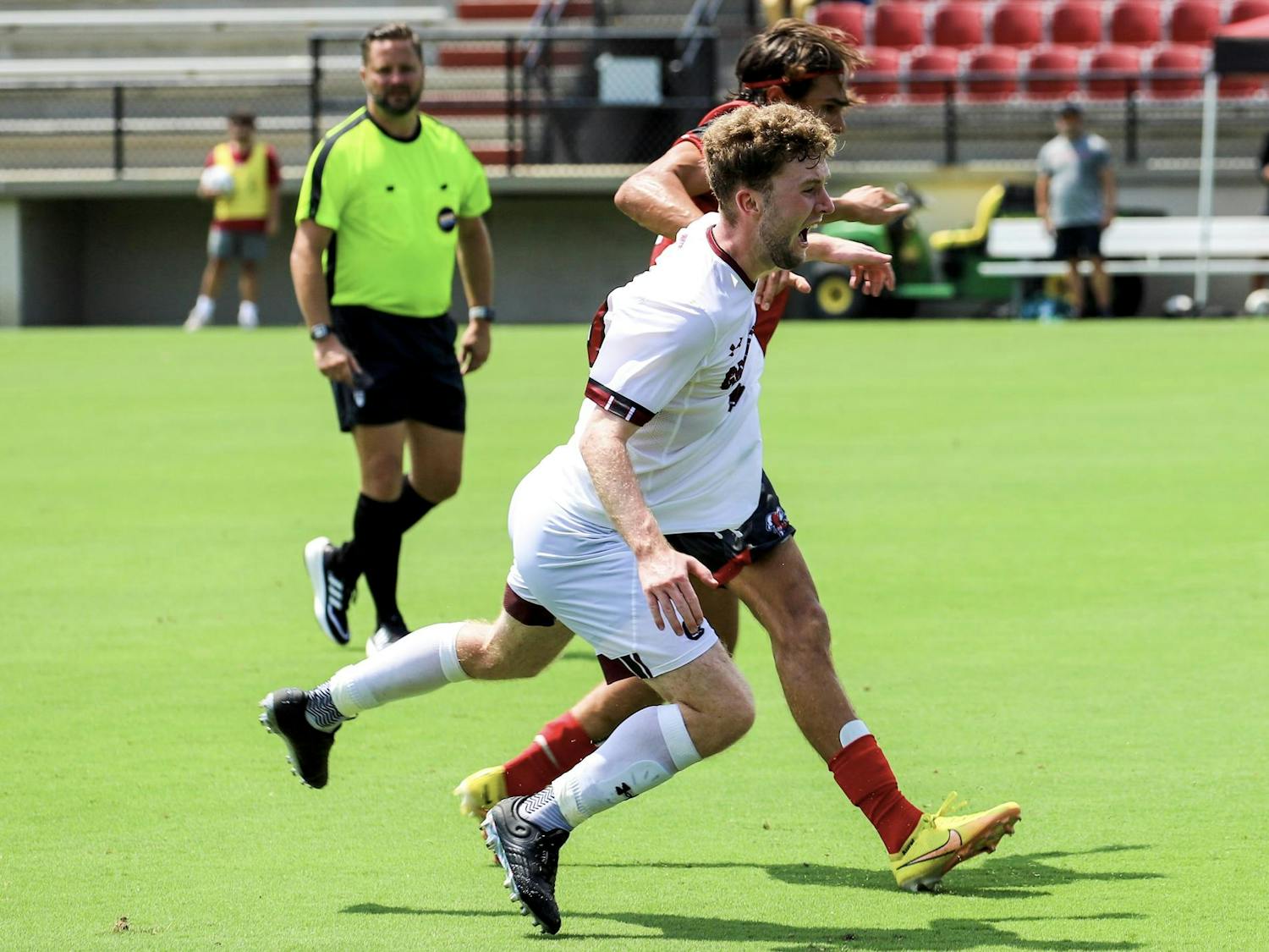 Redshirt sophomore midfielder Jack Burgess fights for the ball during the match against Gardner-Webb on Aug. 27, 2023. The Bulldogs defeated the Gamecocks 2-0 at Eugene E. Stone III Stadium.