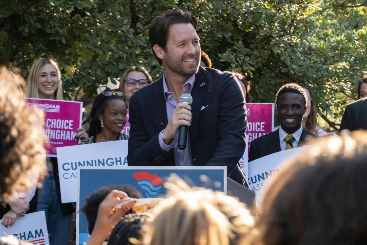 Democratic nominee for Governor of South Carolina, Joe Cunningham presents his campaign to a crowd of students on the Russell House Patio on Oct. 20, 2022. Cunningham spoke on women’s rights, the legalization of marijuana and sports betting, raising teacher pay, and fixing roads. &nbsp;The democratic nominee finished his afternoon rally by speaking directly to students and taking pictures with his supporters in attendance. Photos captured by Kristen Pittman | The Daily Gamecock