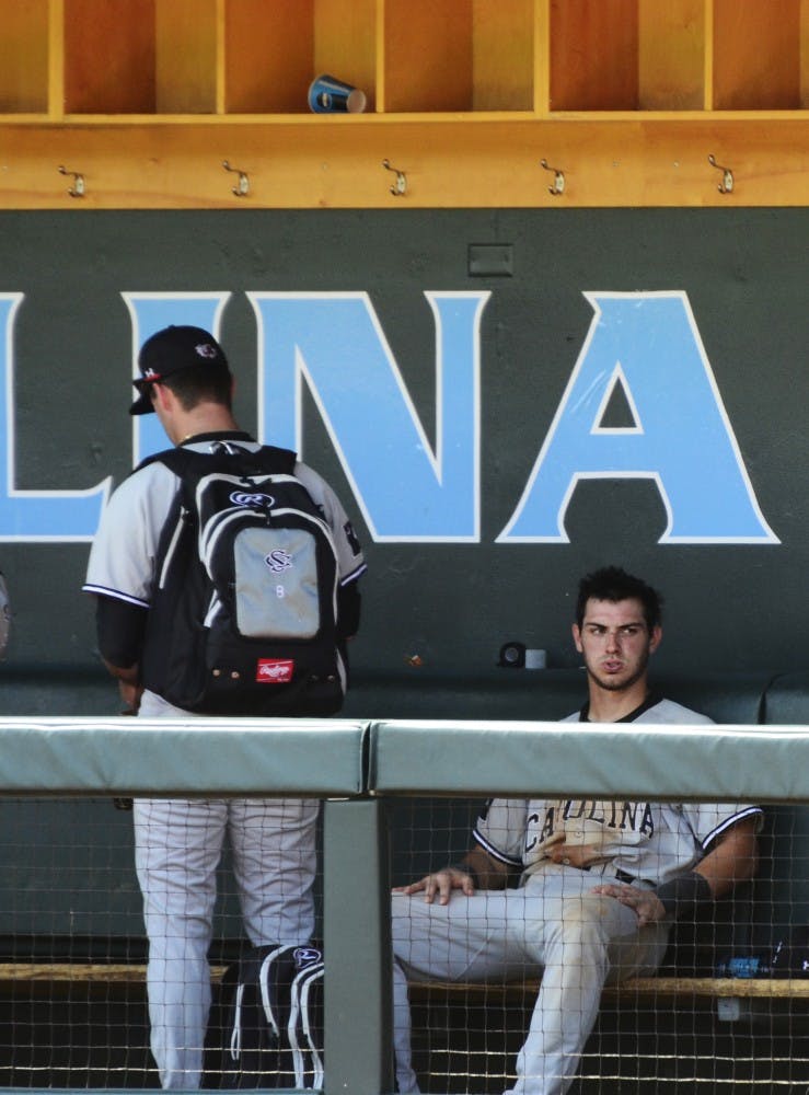 Chase Vergason frustrated in the dugout after the Gamecocks 6-5 loss to UNC.