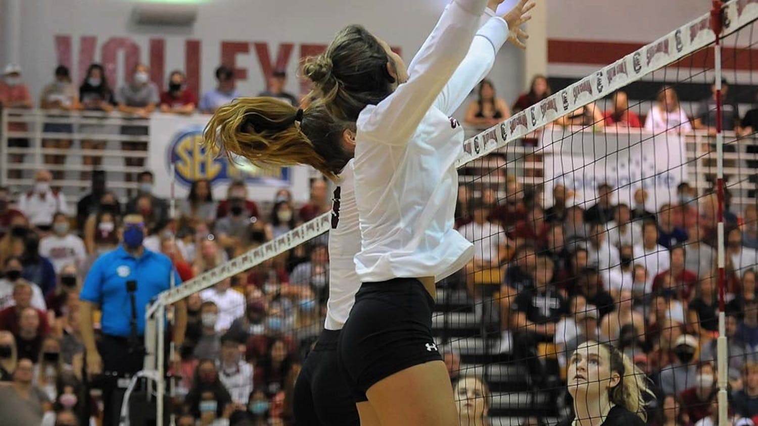 Sophomore blocker Ellie Ruprich returns the volleyball to the Knights next to freshman right side Lauren McCutcheon. The Gamecocks beat the Knights in 3-1 sets, and maintained their undefeated streak. 