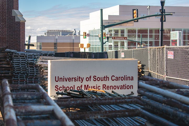 The Greene Street United Methodist Church, now hidden behind metal pipes and pallets, will be the new location of the USC School of Music's jazz program. The first phase of renovation is set to be finished by fall 2023.
