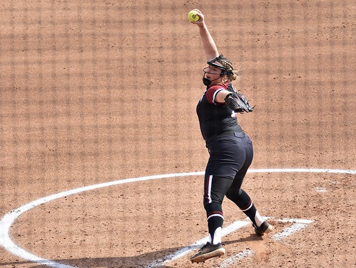 Freshman pitcher Leah Powell pitches the ball against an Arkansas batter.