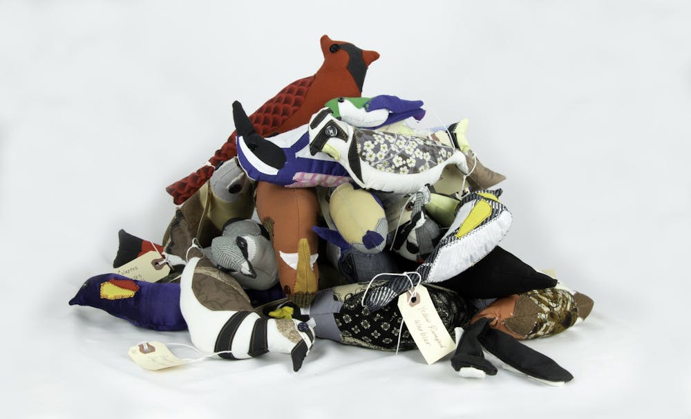 A pile of the stuffed birds highlighting the playful, malleable quality Guanlao intended.
