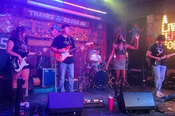 The Close Proximity band performing at Tin Roof in Columbia, South Carolina, on April 30, 2025.