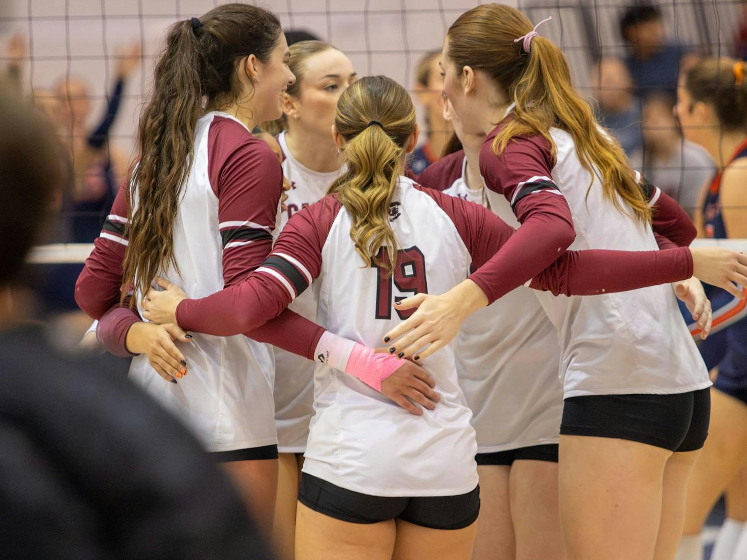 Gamecocks celebrate after winning a point against Auburn on Oct. 26, 2024 in Columbia, S.C. The team marked senior night with high energy as they rallied together for a victory.