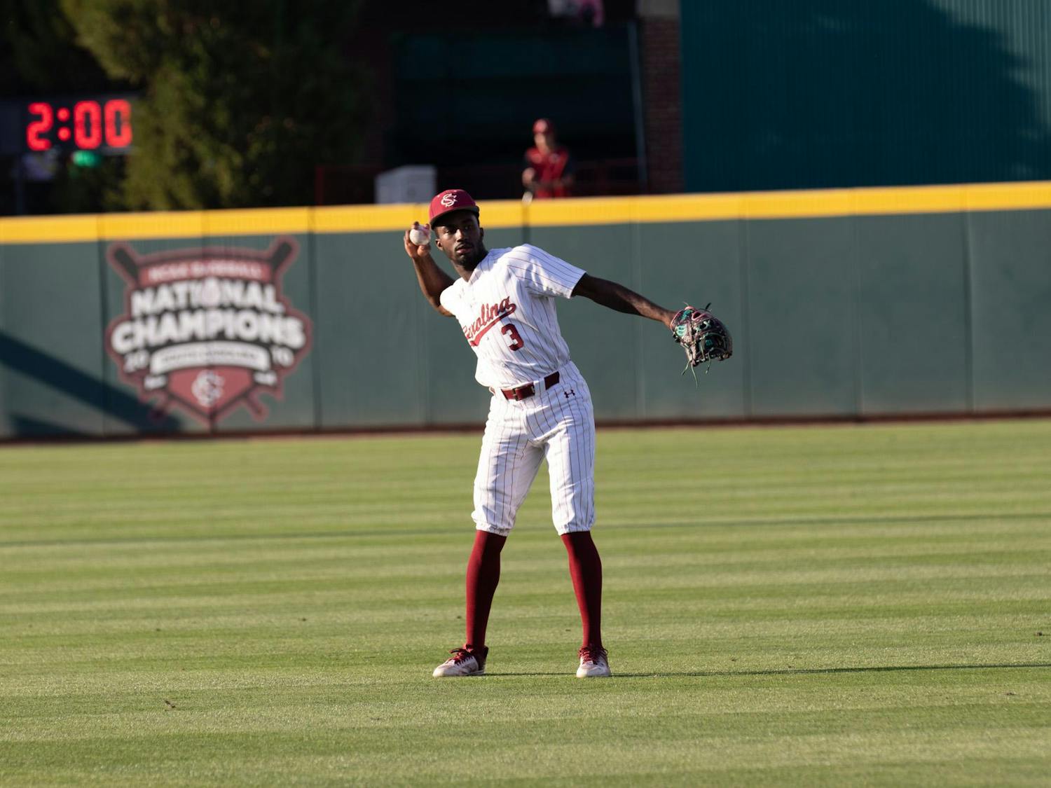 Freshman infielder Lee Ellis warms up in the outfield before the evening matchup against the Razorbacks on April 19, 2024, at Founders Park. The No 20. Gamecocks looked to improve its conference record of 8-8 as it entered week six of SEC play.