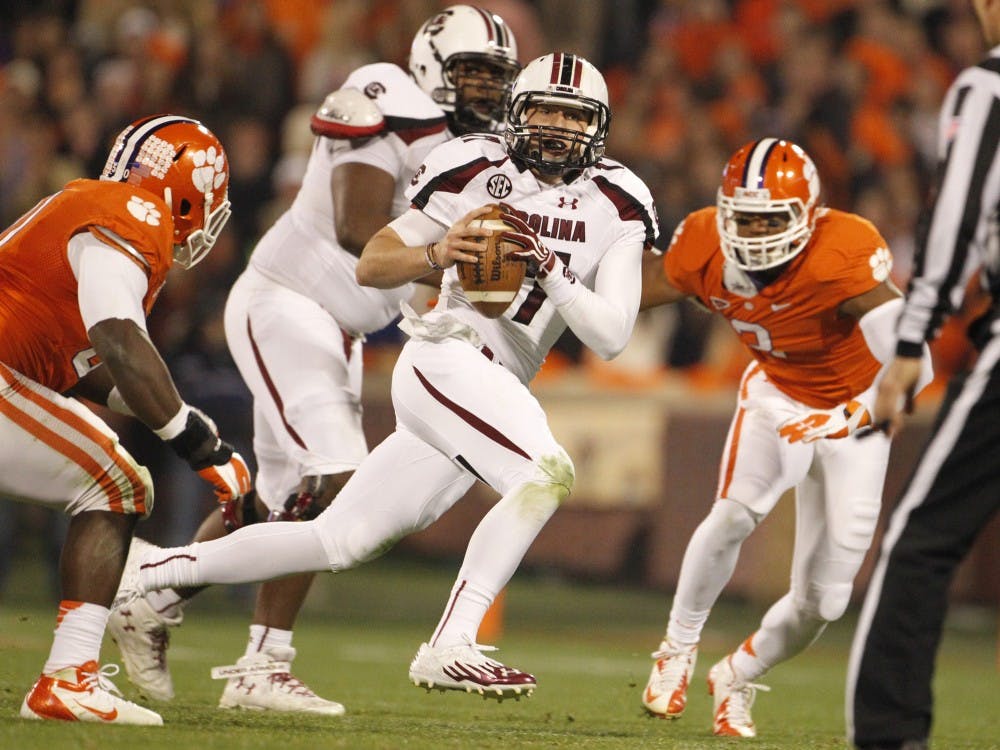 South Carolina Gamecocks quarterback Dylan Thompson (17) looks to pass in the third quarter of their game against Clemson at Memorial Stadium on Saturday, November 24, 2012, in Clemson, South Carolina. (Gerry Melendez/The State/MCT)