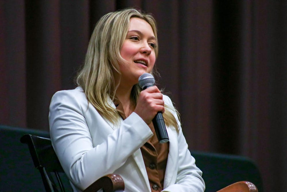 <p>FILE — Third-year accounting student Hannah Augsbach Lamma answers a question at the Student Government debate on Feb. 15, 2023. Lamma is the current treasurer for USC's Student Government.</p>