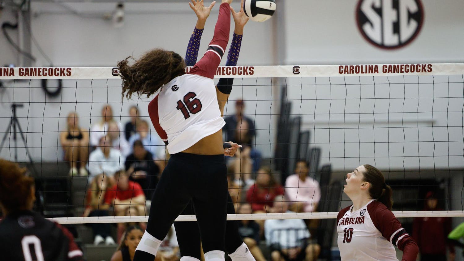 Senior middle blocker Oby Anadi hits the ball during the final moments of the second set against East Carolina University on Sept. 17, 2024. Anadi completed the game with 11 kills.