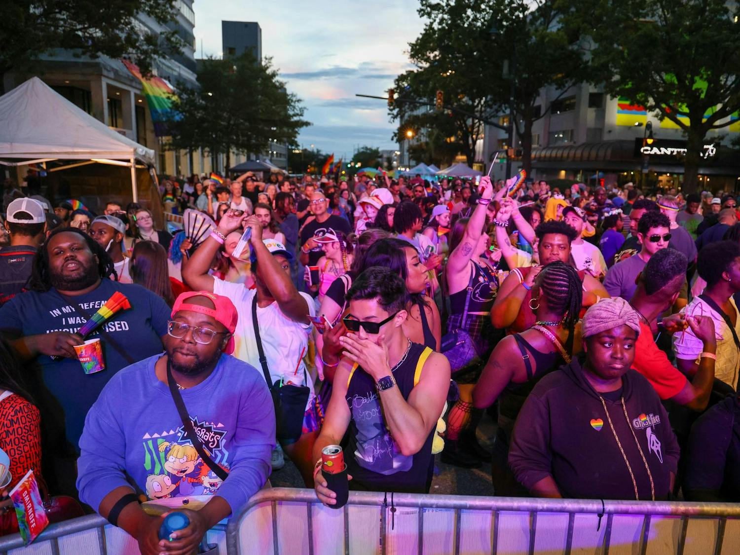 A crowd of people dance together in front of the Smirnoff Main Stage at the Famously Hot SC Pride Festival on Oct. 4, 2025. DJ EZ, the main DJ for the night, played songs for the crowd in between performer sets.
