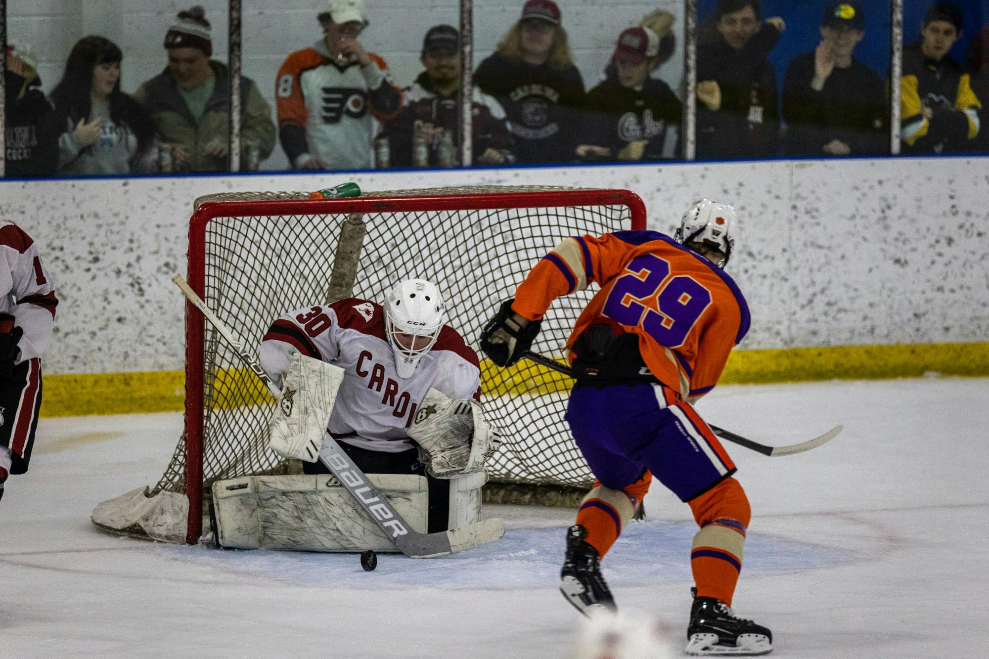 Senior goalie Liam Gormley deflects the puck from an advancing Clemson opponent on Nov. 11, 2022. Clemson failed to overcome the defensive strides from the South Carolina club hockey team, coming up short against the Gamecocks 5-4.