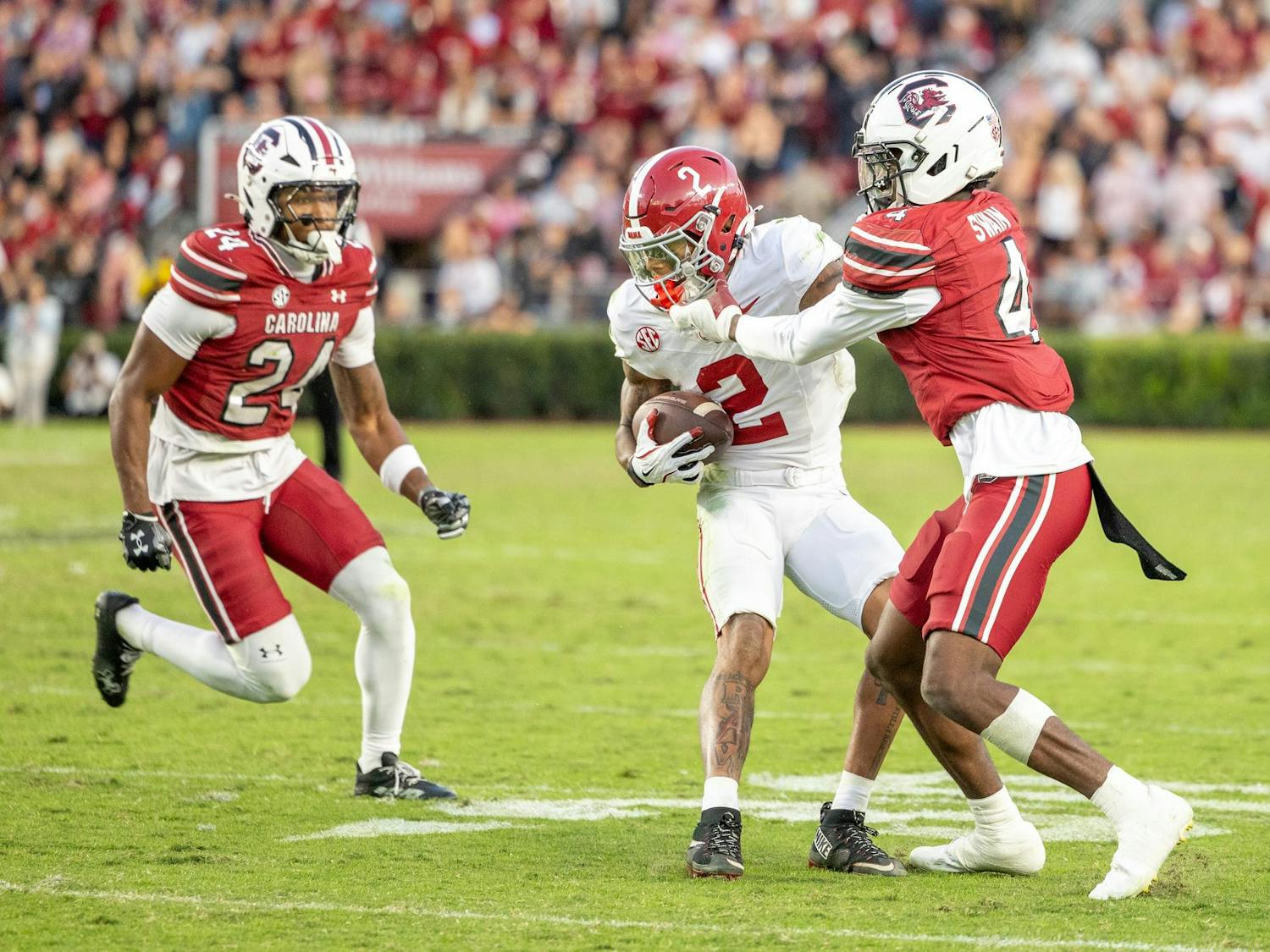 Redshirt sophomore defensive back Vicari Swain (right) attempts to tackle an Alabama offensive player in a game on Oct. 25, 2025, at Williams-Brice Stadium. Swain had two solo tackles and one sack against the Crimson Tide.