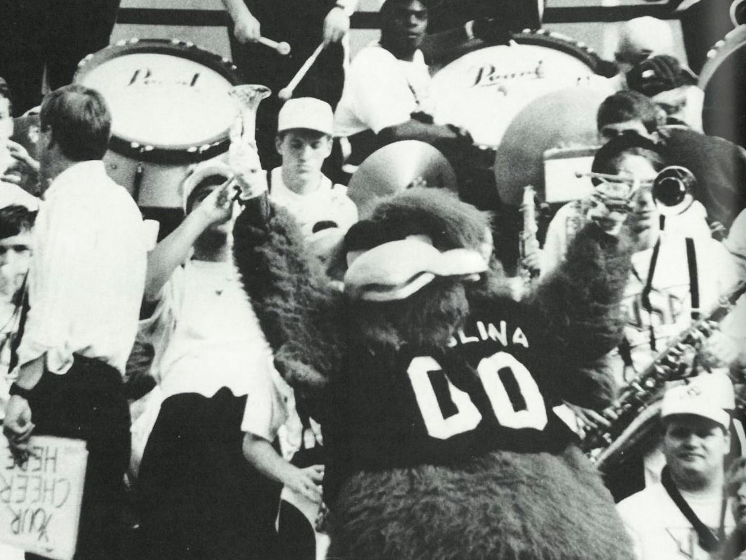 Cocky joins the Carolina Band in the stands at a football game in 1994. Though many students often see Cocky on the field at football games, his shenanigans aren't limited to the sidelines.&nbsp;