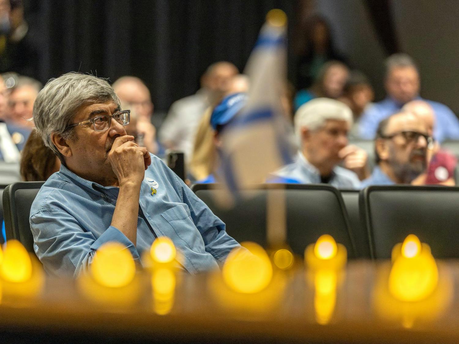 Dr. Josef Olmert, former adjunct professor for the University of South Carolina, listens to speakers during the Israel Solidarity Rally hosted by Gamecocks for Israel on Oct. 7, 2024. Native Israeli and former director of communications for Israel, Dr. Olmert was the founding faculty sponsor for Gamecocks for Israel at USC.