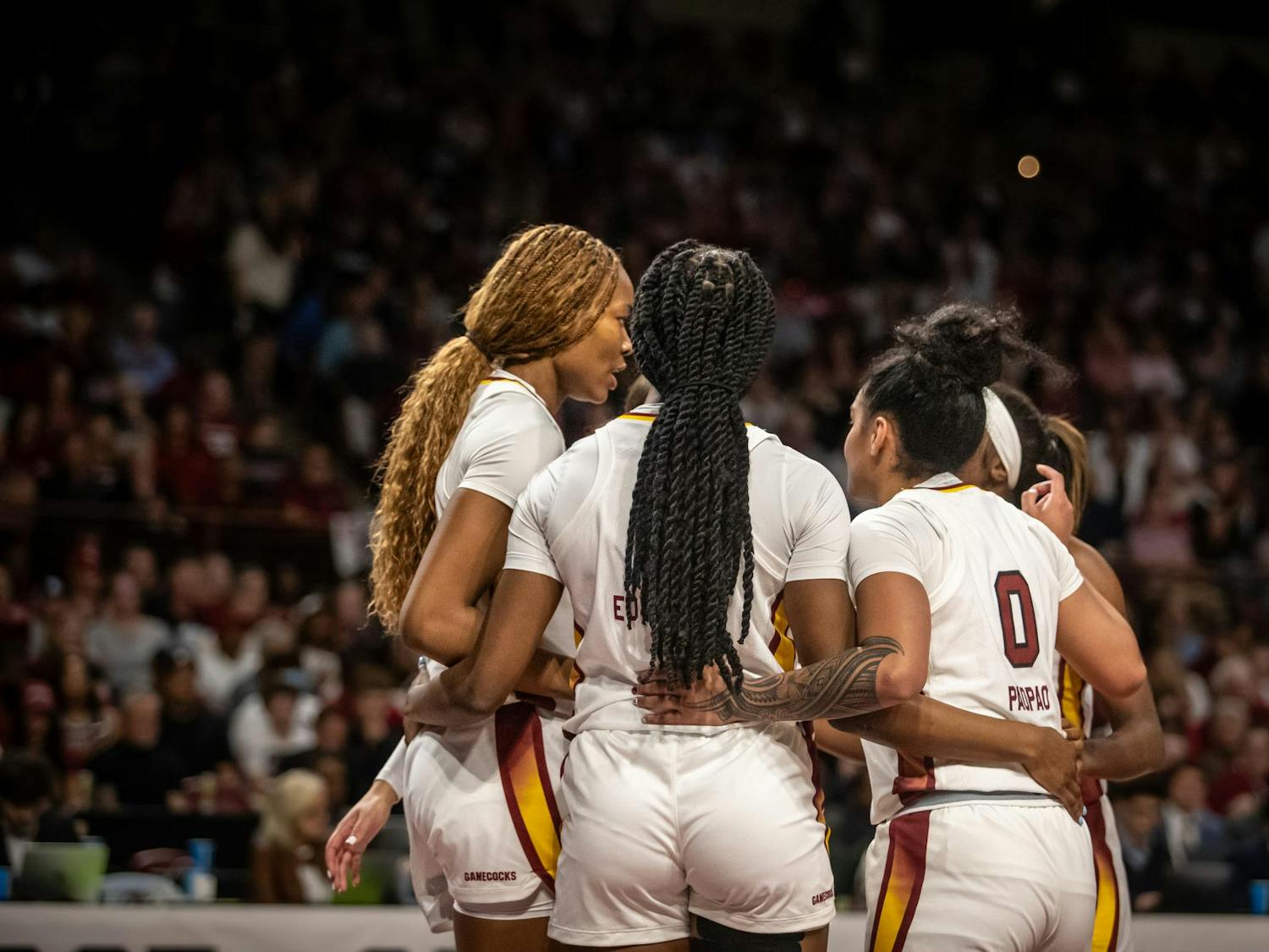 Members of the University of South Carolina basketball team huddle on the court as they face off against Indiana in the second round of the NCAA March Madness tournament on March 23, 2025. The Gamecocks are now headed to the Sweet 16 for the 11th year in a row.