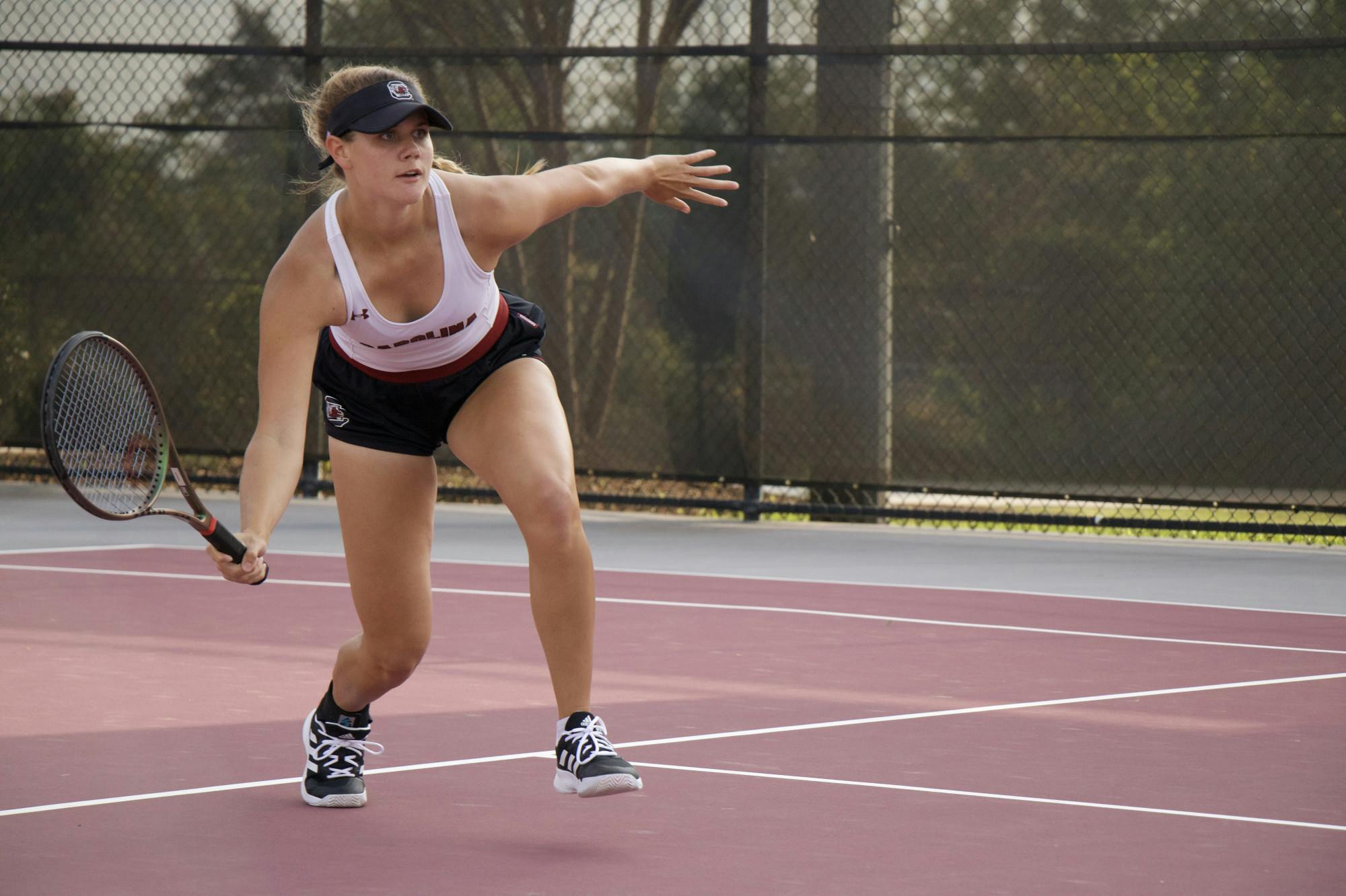 FILE—Freshman Mckenna Schaefbauer returns a big serve on March 1, 2023, at Carolina Tennis Center. Schaefbauer was Illinois class 1A single state champion in 2018.  