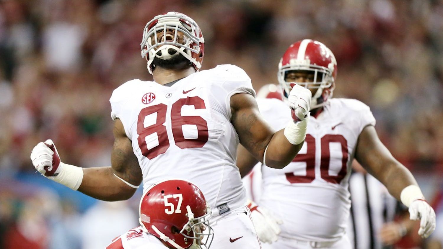 Alabama defensive lineman A'Shawn Robinson reacts after tackling Missouri running back Marcus Murphy for a three-yard loss in the third quarter of the 2014 SEC Championship Saturday, Dec. 6, 2014 at the Georgia Dome in Atlanta. Alabama won 42-13. (Chris Lee/St. Louis Post-Dispatch/TNS)