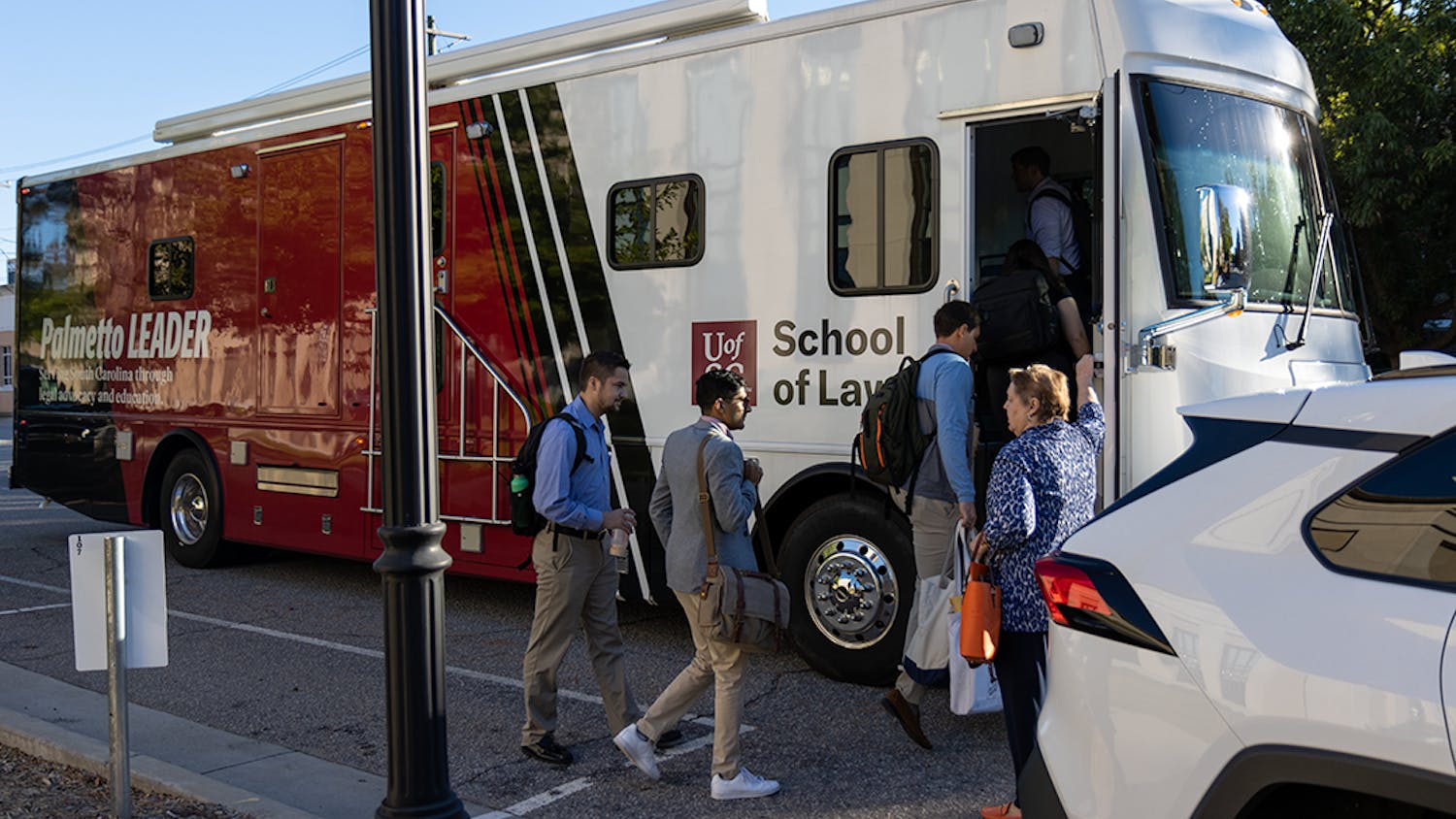 The Palmetto LEADER bus accepts its first passengers destined for rural South Carolina to offer legal services. This technology-equipped bus has office spaces and Wi-Fi for USC Law Students.