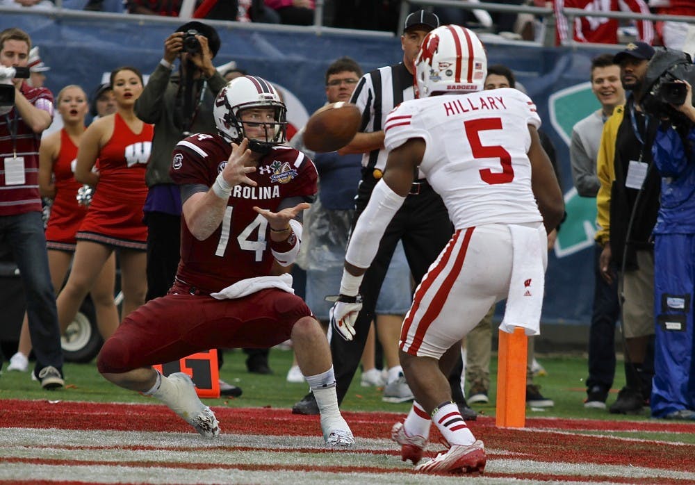 	<p>Senior quarterback Connor Shaw hauls in the first reception of his career in the second quarter of the Gamecocks&#8217; 34-24 win over Wisconsin in the 2014 Capital One Bowl.</p>