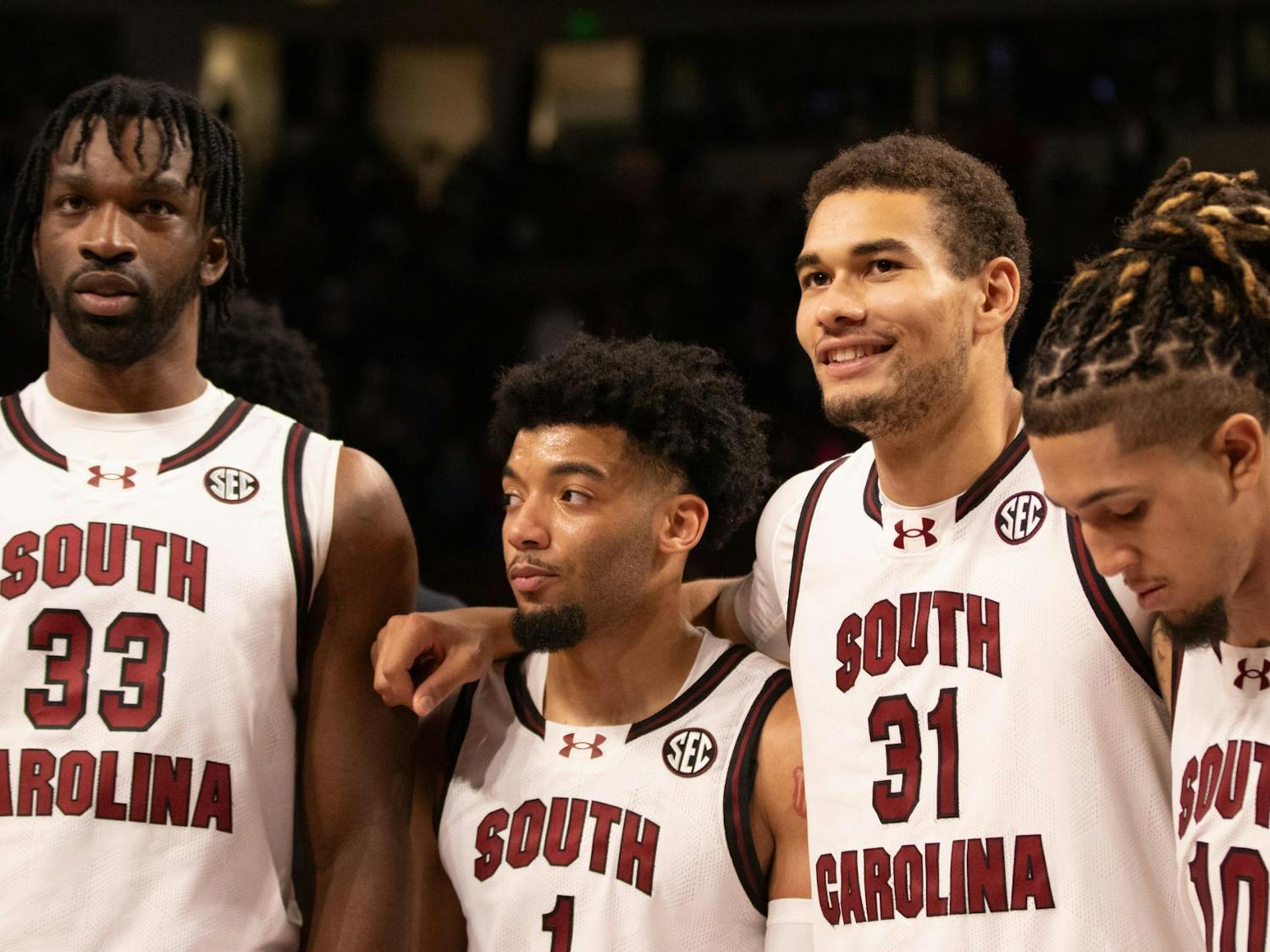 South Carolina men’s basketball players gather around for the alma mater after a win against Notre Dame on Nov. 28, 2023. The Gamecocks won 65-53 against the Fighting Irish at Colonial Life Arena to extend its undefeated streak to six games.