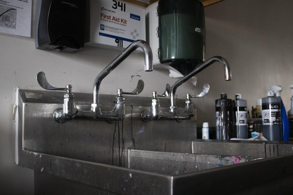 <p>A second-floor lab room sink sits inactive in McMaster College's School of Visual Art and Design on Oct. 31, 2023. Some sinks like the one in the lab have become backed up and filled with paint, students said.</p>