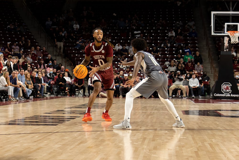 <p>Graduate student guard James Reese looks for an open teammate to pass the ball to. South Carolina won this game against UAB on Nov. 18, 2021 by a score of 66-63.</p>