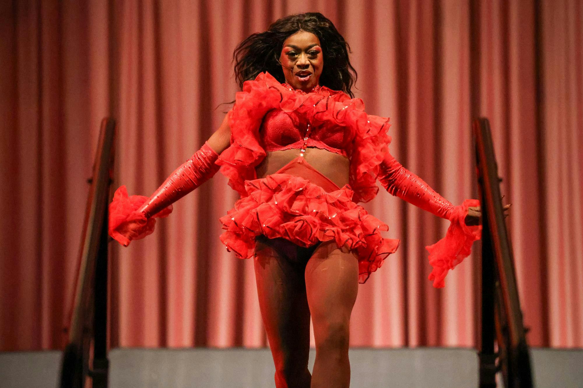 Drag queen Susu Serenity struts down the stage after an outfit change in the Russell House Ballroom on April 14, 2026. Birdcage is one of the last of IRIS’s LGBTQ+ events each spring semester.