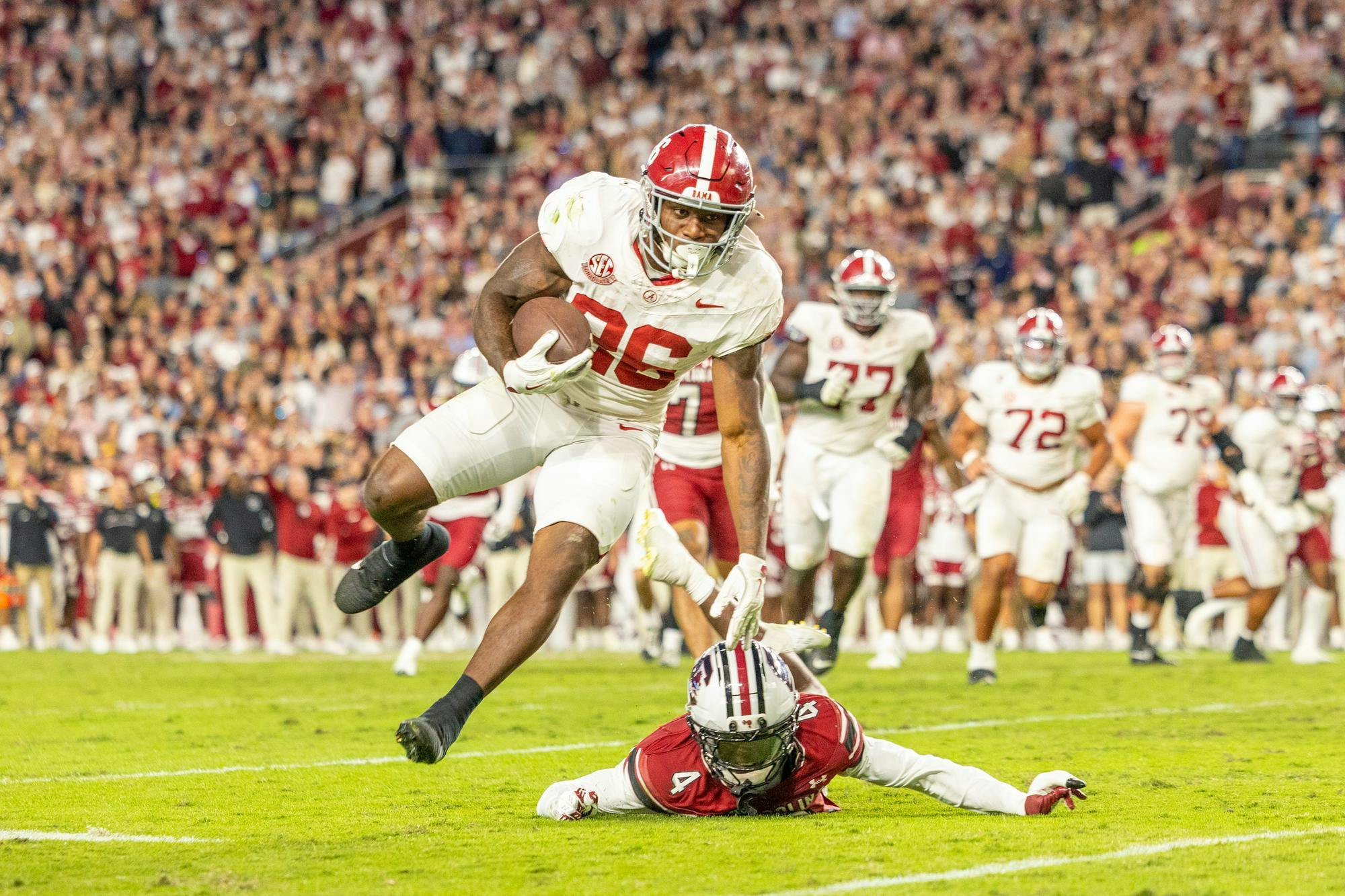 Redshirt sophomore defensive back Vicari Swain (bottom) falls while chasing an Alabama offensive player on Oct. 25, 2025, at Williams-Brice Stadium. The Gamecocks lost to the Crimson Tide 29-22.